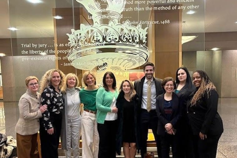 From Left to Right: Lawyer Kate Oeltjen with plaintiffs Stephanie Randall, Debbie Aleardi, Nicole Deusinger, Heather McQuilkin and Natalie Petrongola, along with lawyers Lane Schiff and Caren Gurmankin, and paralegals Danielle Buccieri and Toni Murphy. Last month, the women won their federal civil rights lawsuit against Rothman. A jury found that Rothman fired them in retaliation for complaining about sex discrimination.