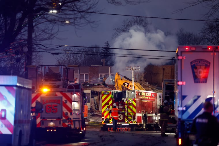 First responders work the scene of an explosion and fire at Bristol Health & Rehab Center, Tuesday, Dec. 23, 2025, in Bristol, Pa.