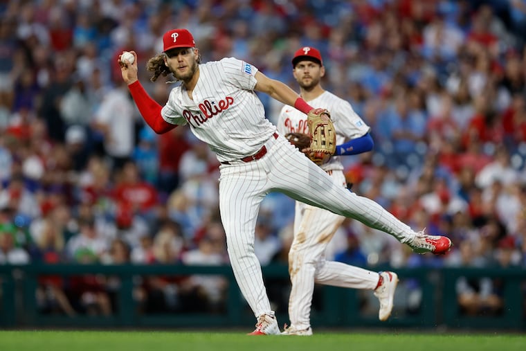 The Phillies will be without their regulars on the left side of the infield in third baseman Alec Bohm (left) and shortstop Trea Turner.