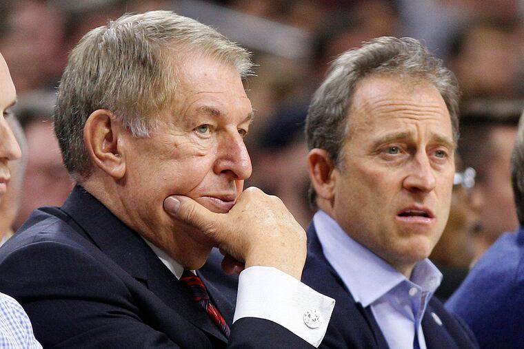 Philadelphia 76ers co-Managing Owner Josh Harris, right, watches the
game with Special Advisor to the Managing General Partner and Chairman of Basketball Operations Jerry Colangelo, left, during the first half of an NBA basketball game against the San Antonio Spurs, Monday, Dec. 7, 2015, in Philadelphia. The San Antonio Spurs won 119-68.