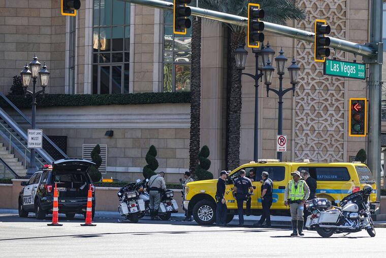 Police at the scene where multiple people were stabbed in front of a casino in Las Vegas on Thursday.