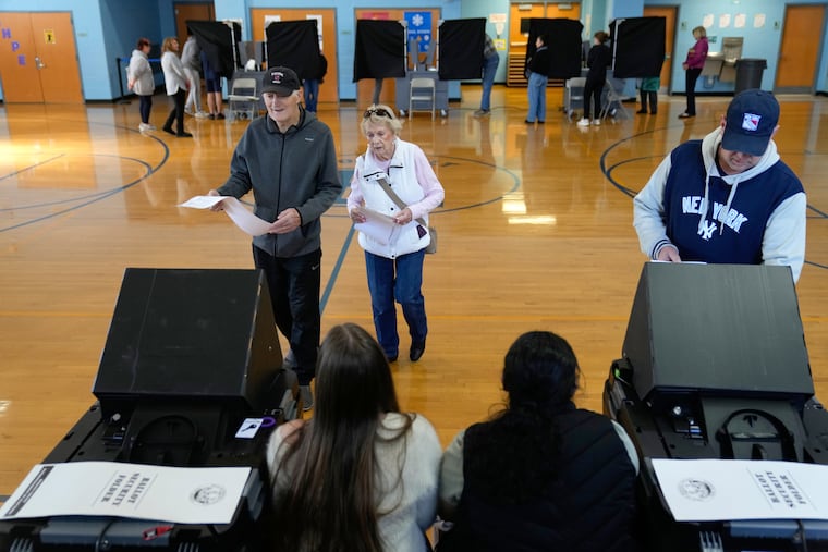 People vote at a polling site in River Edge, N.J., Nov. 4, 2025. (AP Photo/Seth Wenig, File)