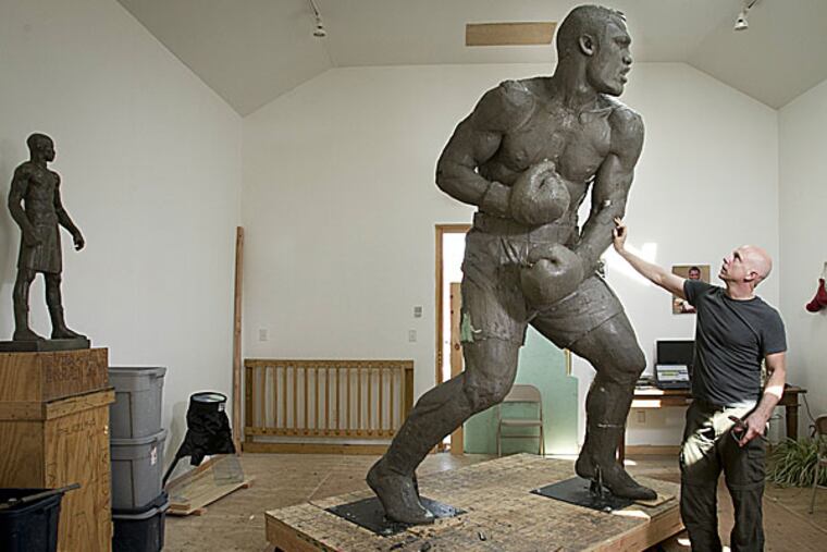 Sculptor Stephen Layne with his Joe Frazier statue. (Alejandro A. Alvarez/Staff Photographer)