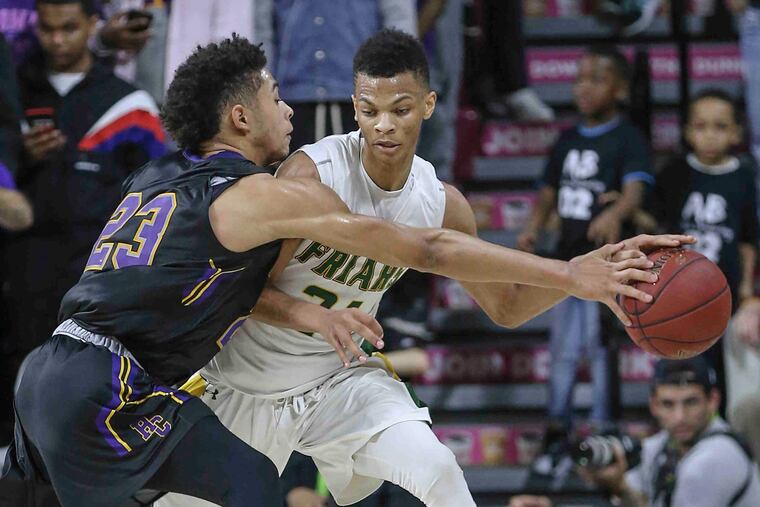 Bonner-Prendie's Isaiah Wong tries to get past Roman Catholic's Seth Lundy during the 2017 Catholic League Championship. Wong and the Friars beat Imhotep in the District 12 Class 4A championship.