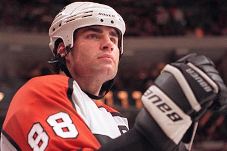 Center Eric Lindros will play for the Flyers in the Winter Classic alumni game on Saturday afternoon. (File photo)