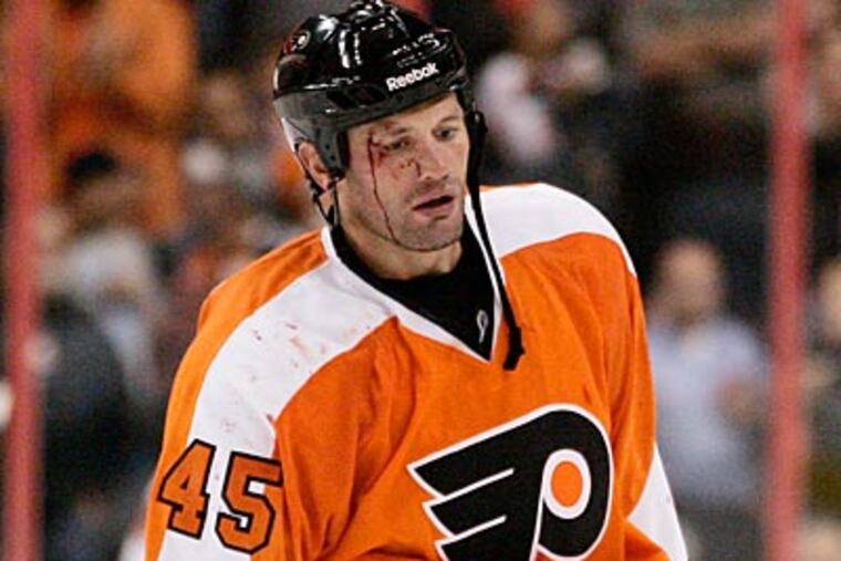 The NHL suspended Flyers forward Jody Shelley for 10 games for his hit on the Maple Leafs' Darryl Boyce. (AP Photo)