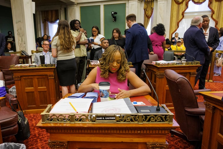 Councilmember Jamie Gauthier at her desk in Council chambers.