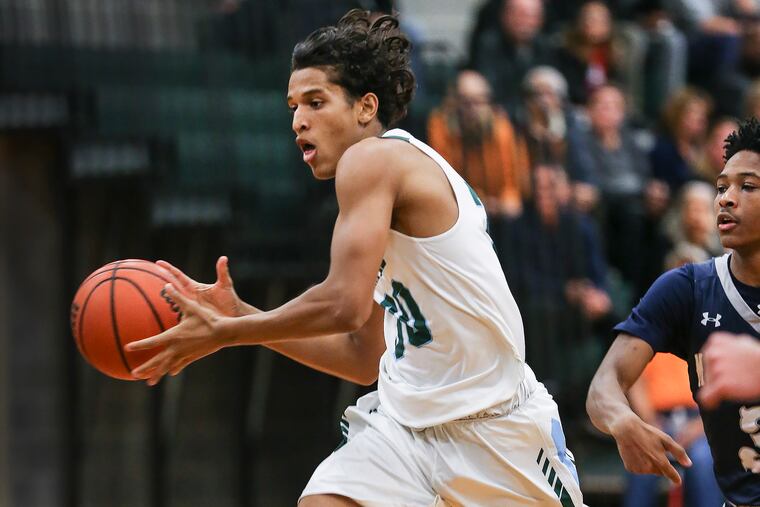 Shipley's Chaz Owens drives on Malvern Prep's Rahdir Hicks during the 3rd quarter in Bryn Mawr, Friday, December 14, 2018. Shipley beats Malvern Prep 71-59. STEVEN M. FALK / Staff Photographer