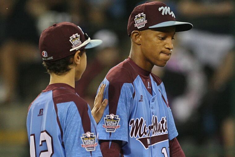 Kai Cummings (right) and Jack Rice (left) of the Taney Dragons. (Michael Bryant/Staff Photographer)