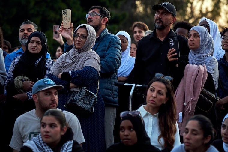 Mourners gather for a vigil to honor the victims of the mass shooting at the Islamic Center of San Diego in California on May 19. Authorities said the teenagers who killed three men at the mosque met online, posted their writings there, and livestreamed the killings.
