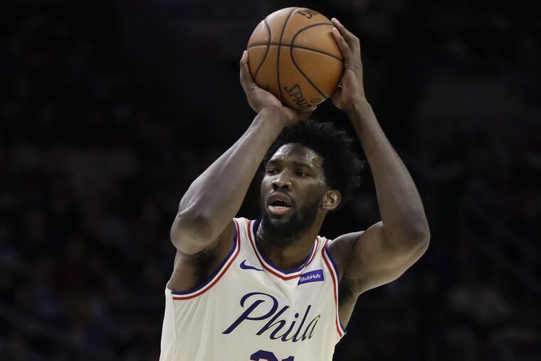 Sixers center Joel Embiid shoots the basketball against the New Orleans Pelicans on Friday, February 9, 2018 in Philadelphia.