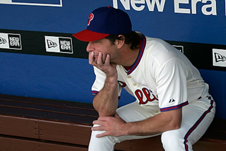 Jamie Moyer reinjured his pitching elbow while playing winter ball in the Dominican Republic. (David Swanson/Staff file photo)