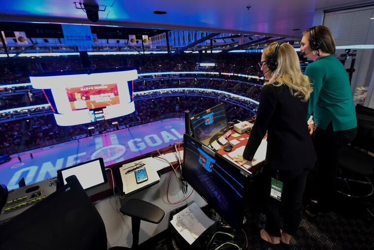 Kate Scott (left) and AJ Mleczko, members of an all-female broadcast team, work during an NHL game between the Chicago Blackhawks and the St. Louis Blues on Sunday.