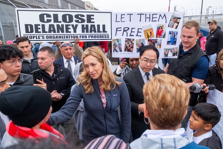 Gov. Mikie Sherrill, center, joins protesters and other elected officials outside Delaney Hall in Newark, N.J., as a hunger strike by detainees entered its fourth day, May 25, 2026.