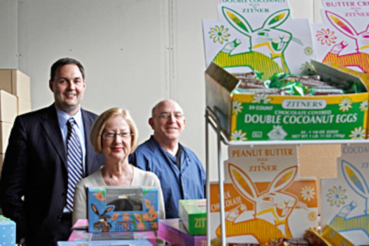 Zitner chief Evan Prochniak (left) stands next to egg display with purchasing manager Gert Palladino and husband Dennis. Prochniak hopes to expand without sacrificing the quality customers crave. MICHAEL S. WIRTZ / Staff Photographer