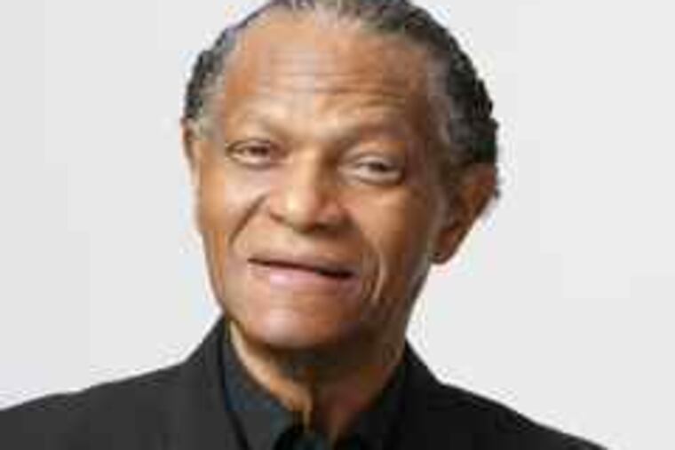 McCoy Tyner, above, and his trio were joined by tenor saxophonist Joe Lovano, below, at Friday's concert.