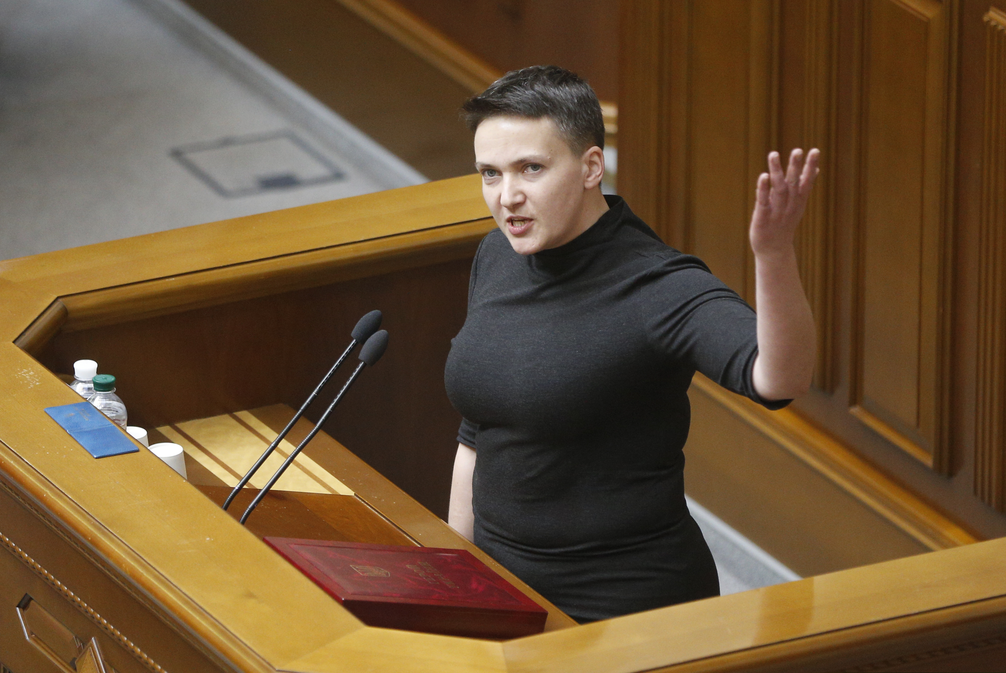 FILE - In this Thursday, March 22, 2018 file photo, Nadiya Savchenko attends a parliament session in Kiev, Ukraine. A celebrated former Ukrainian military pilot in jail on charges of plotting an attack on parliament says she has started refusing food and water in protest. Nadiya Savchenko said Wednesday, Dec. 5, 2018 she wants to protest what she called blackmail and pressure by investigator. (AP Photo/Efrem Lukatsky, File)