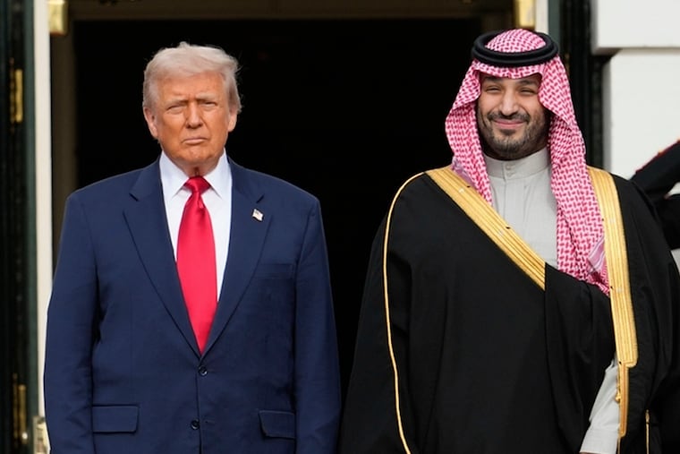 FILE - President Donald Trump stands with Saudi Arabia's Crown Prince Mohammed bin Salman on his visit to the White House, Nov. 18, 2025, in Washington.