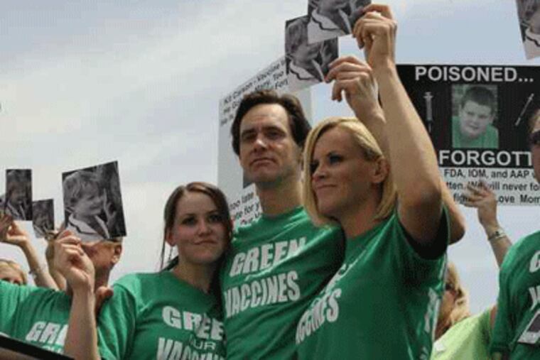 Jenny McCarthy (right) with then-boyfriend actor Jim Carrey (center) and his daughter Jenny on "Frontline."