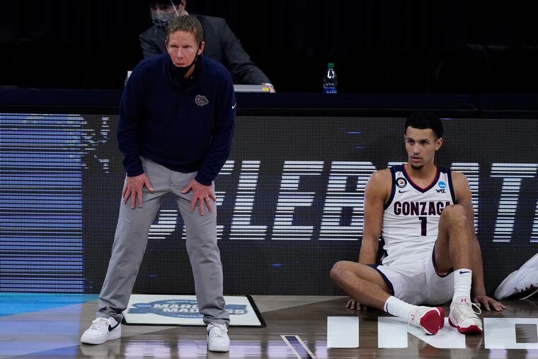 Gonzaga head coach Mark Few and guard Jalen Suggs (1) will be heading to the championship game after a dramatic last-second 93-90 overtime win over UCLA.