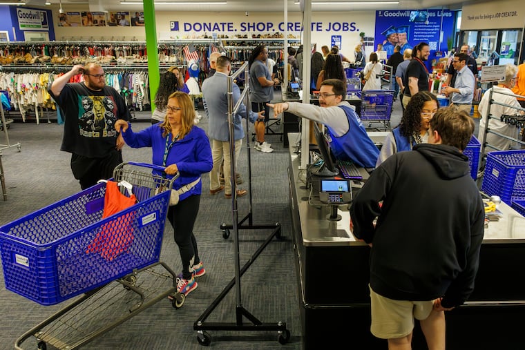 Shoppers and employees are shown on opening day of the new 19,000-square-foot Goodwill store that opened on Clements Bridge Road in Deptford last month.