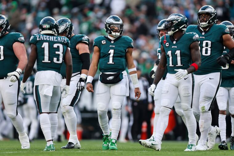 Eagles' Jalen Hurts takes the field with the offense against the Arizona Cardinals on Dec. 31.
