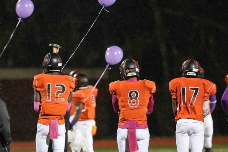 Del-Val vs. Strawberry Mansion at half time the game is dedicated with purple balloons to Aisha Abdur Rahman, the Del-Val student killed in a shooting last year. Teammates Thursday, October 1, 2015.
