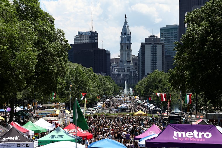 People fill the street during the Philly Pride Festival along the Ben Franklin Parkway on Sunday.