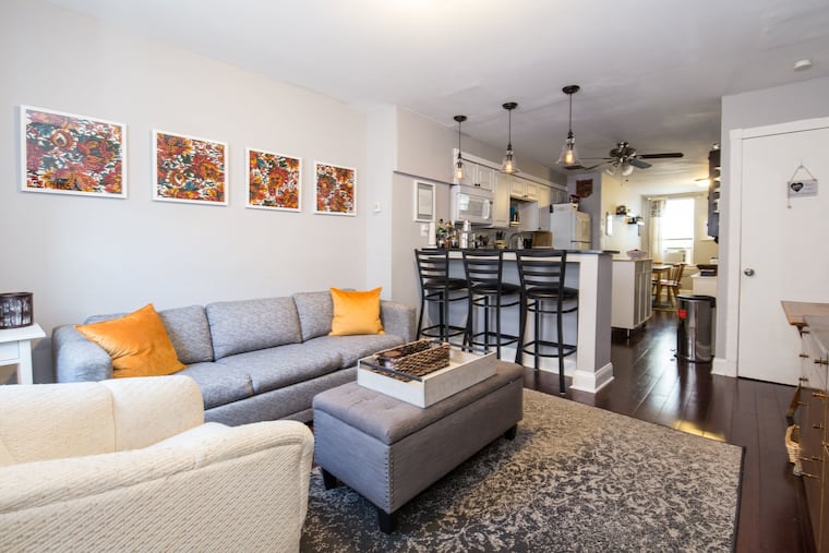 The open-floor-plan house has two bedrooms and one bath, plus a patio.