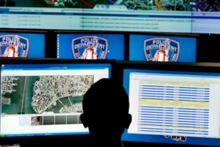 A worker at the new facility, which opened earlier this month, views a map of Lower Manhattan on a monitor.