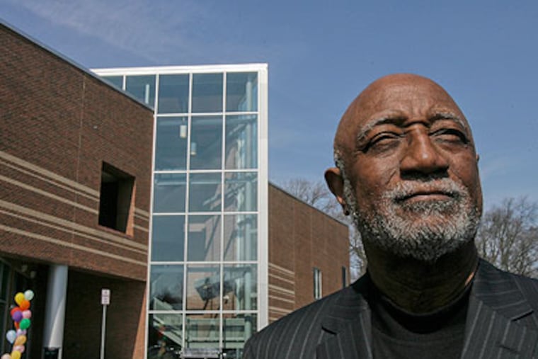 Lincoln University President Ivory Nelson stands next to a new International Cultural Center. (Akira Suwa / Staff Photographer)