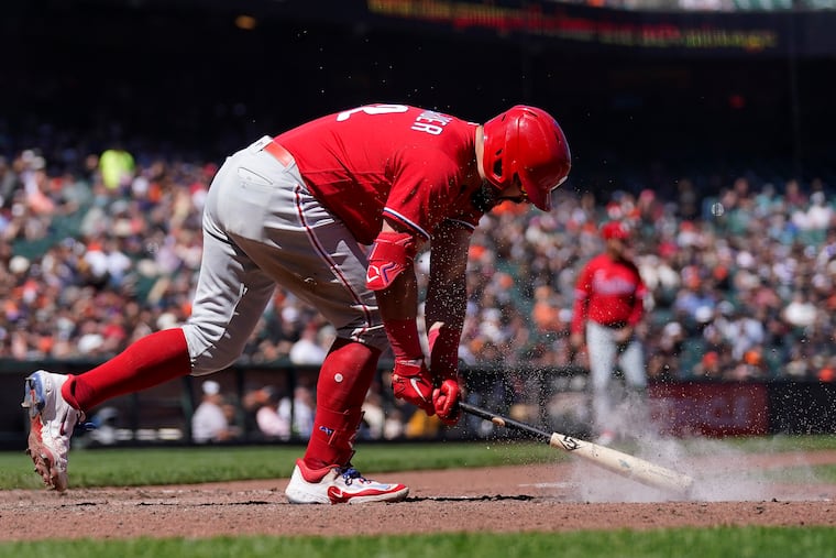 Kyle Schwarber of the Phillies reacts after flying out during the eighth inning of the loss to the Giants in San Francisco.