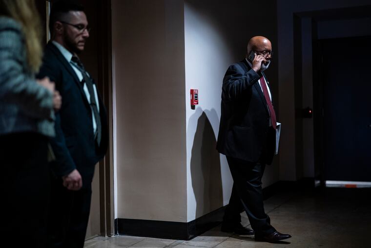 Chairman Bennie Thompson, D-Miss., talking on the phone June 21 as he headed to a meeting with members of the House select committee investigating the Jan. 6 attack on the U.S. Capitol.