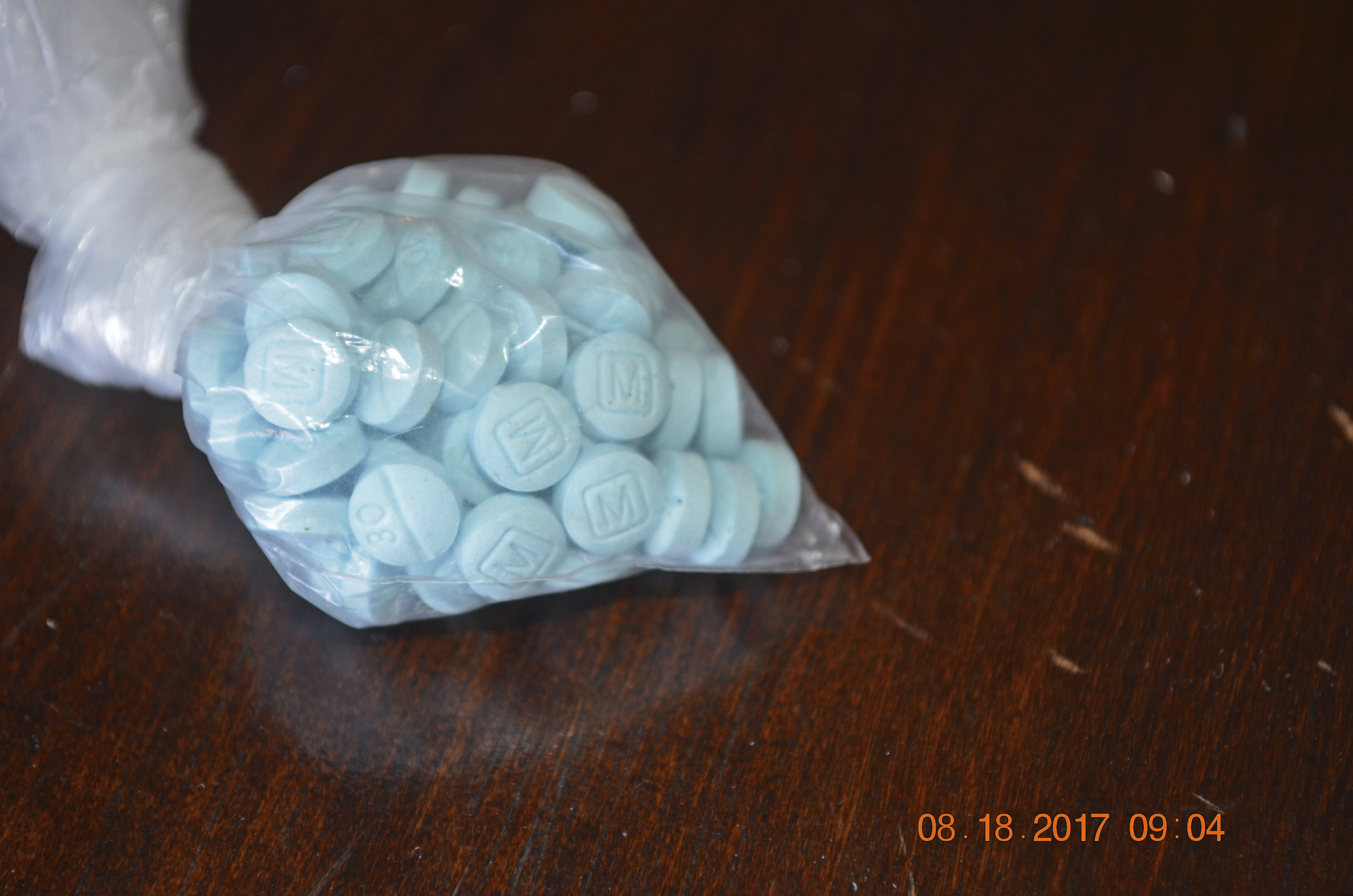 This photo provided by the U.S. Drug Enforcement Administration's Phoenix Division shows a closeup of fentanyl-laced pills that mimic prescription oxycodone.