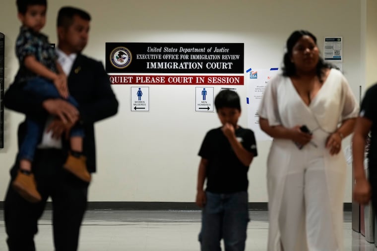 People arrive for immigration court hearings in New York, Monday, July 27, 2026.