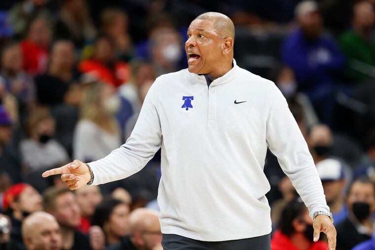 Sixers coach Doc Rivers yelling toward his bench during a November home game.