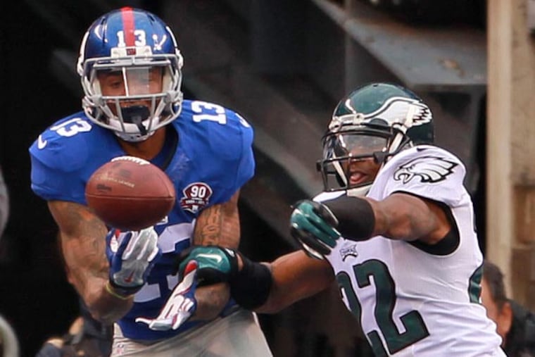 Brandon Boykin knocks the ball away from Odell Beckham Jr. in the end zone. (Ron Cortes/Staff Photographer)