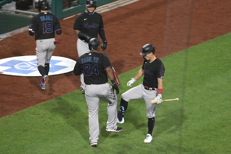 The Marlins' infected players and coaches will be sent back to Miami while the rest of the team stays in Philadelphia, waiting to find out when they will resume play again.