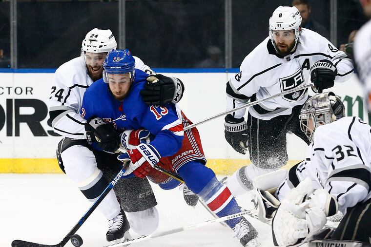 Kevin Hayes battles for the puck with the Kings' Derek Forbort during a February game.