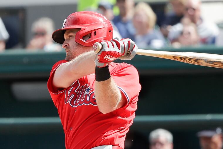 Logan Forsythe watches his fourth-inning RBI groundout leave the bat Friday in the Phillies' 9-0 spring training win over Detroit.