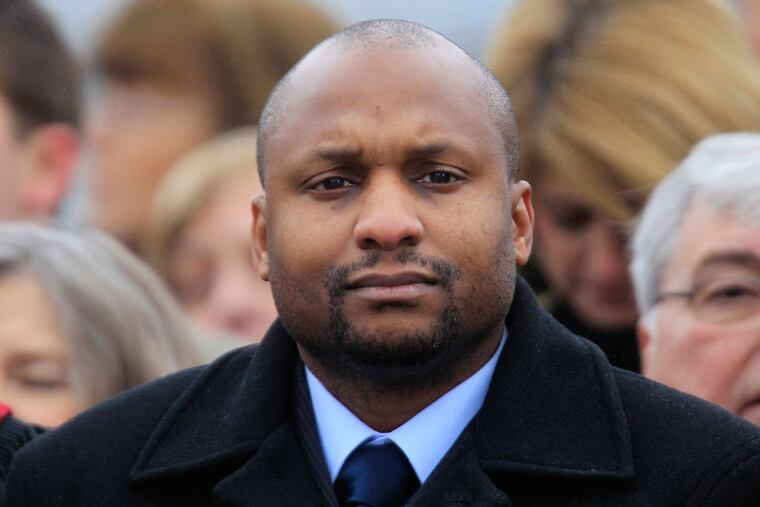 Jerold Gibson: Caught on camera taking $140 from a car. (MATT ROURKE / ASSOCIATED PRESS)