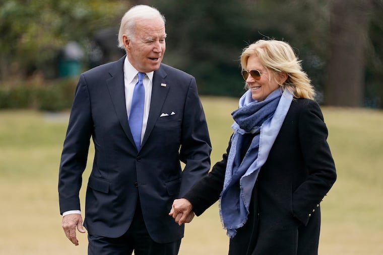 President Joe Biden and first lady Jill Biden arrive on the South Lawn of the White House, Jan. 23, 2023, in Washington in this file photo.