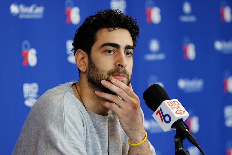 Sixers guard Furkan Korkmaz listens to questions while meeting with the media at the Sixers Training Complex on Friday, May 13, 2022 in Camden.