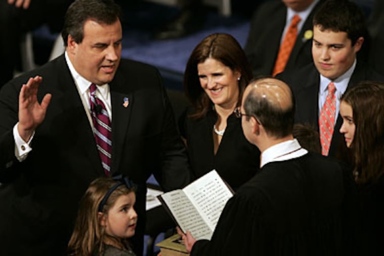Chris Christie is sworn in as governor of New Jersey by the
Honorable Stuart Rabner, Chief Justice, New Jersey Supreme Court as
his wife Mary Pat and children look on. (AP Photo/Rich Schultz)