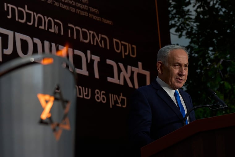 Israeli Prime Minister Benjamin Netanyahu speaks at the state memorial for Ze'ev Jabotinsky, at Mount Herzl Military Cemetery in Jerusalem, Tuesday, July 14, 2026.