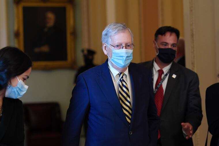 Senate Majority Leader Mitch McConnell of Ky., walks back to his office on Capitol Hill in Washington.