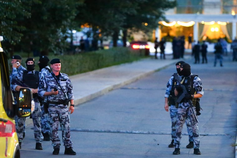 Police block an area near a deadly explosion at a restaurant in Moscow, Saturday, Aug. 1, 2026.