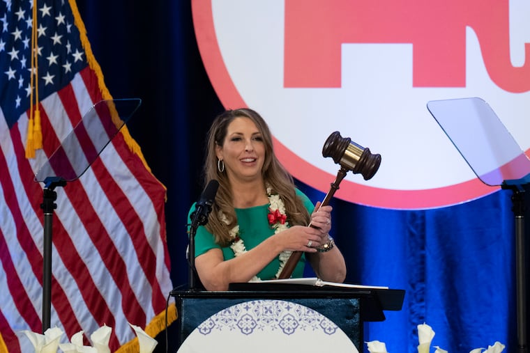 Re-elected Republican National Committee Chair Ronna McDaniel holds a gavel while speaking at the committee's winter meeting in Dana Point, Calif.