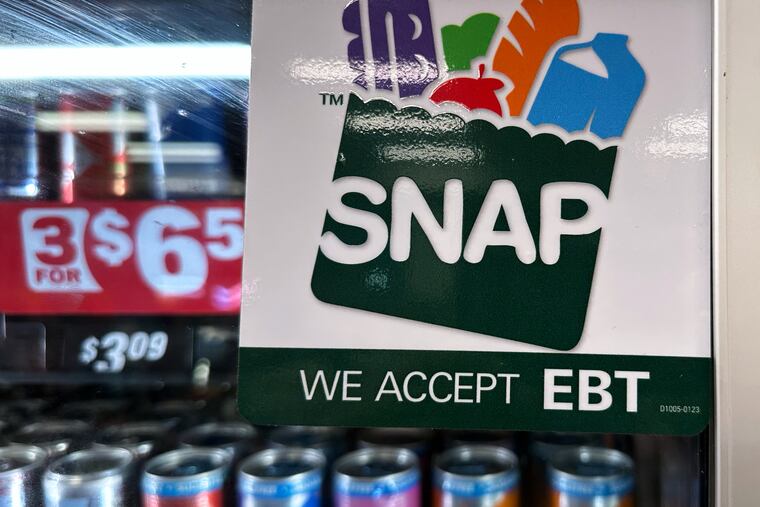 FILE - SNAP EBT information sign is displayed at a gas station in Riverwoods, Ill., Saturday, Nov. 1, 2025.