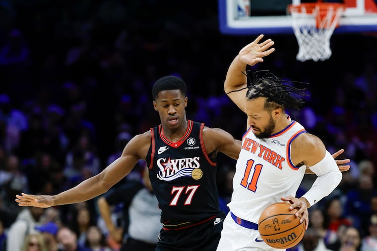 Sixers guard VJ Edgecombe defends Knicks guard Jalen Brunson during a game earlier this season.